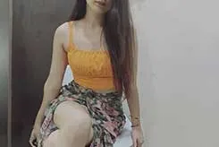 Madhu in lingerie sitting in the car with gate open, in the jungle somewhere