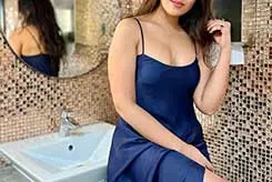 Meetali in sexy blue dress showing her bust size