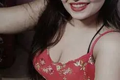 Sexy Parvina lying on top of the table in a bar